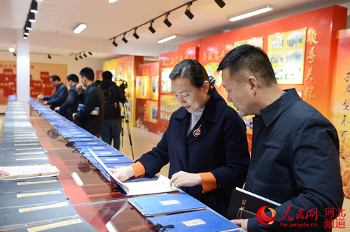 圖為崗上村《功德錄》展覽。陳汝健 攝